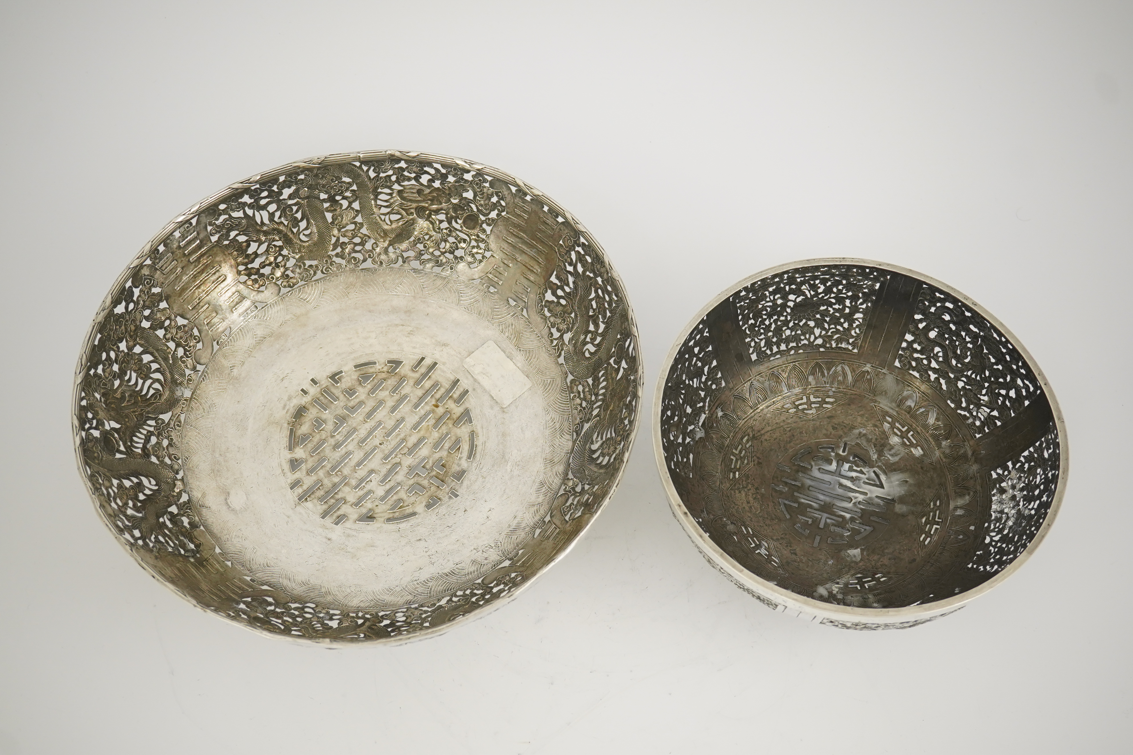 Two early 20th century Chinese Export pierced silver circular bowls